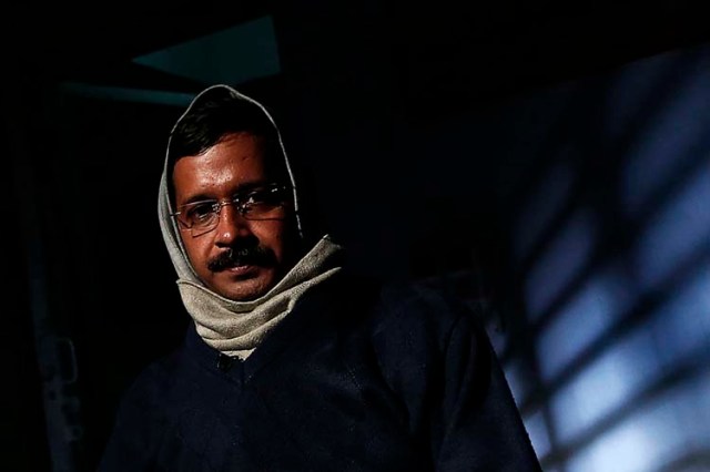 Delhi's CM Kejriwal, chief of AAP poses before the start of an interview with Reuters at his residence on the outskirts of New Delhi